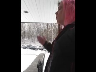 Chubby transsexual skank smoking in the snow